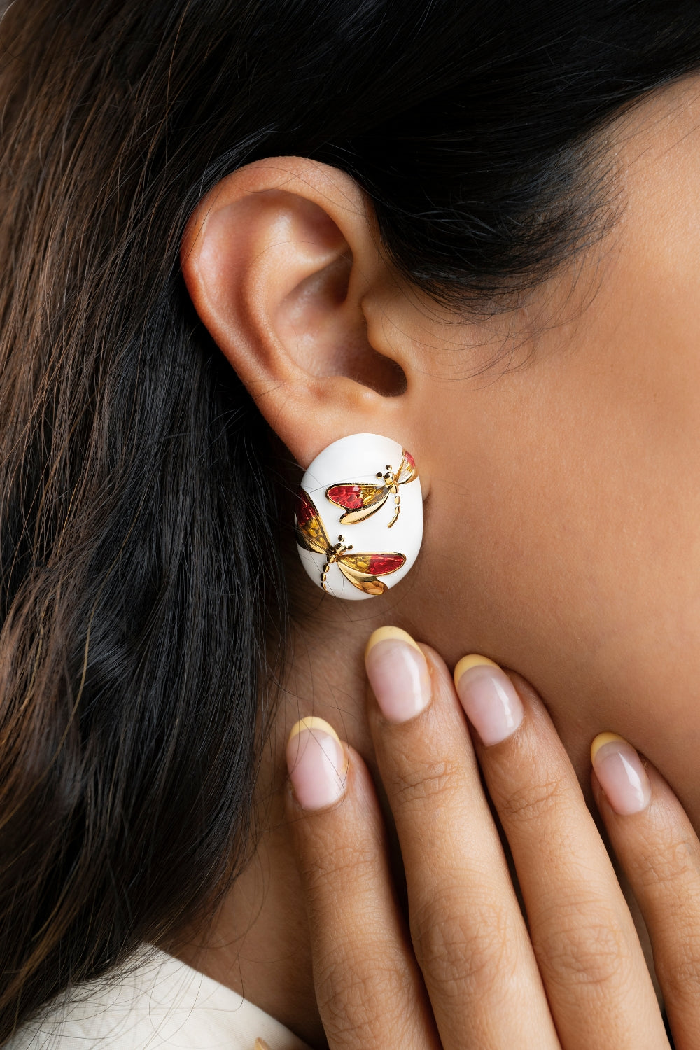 Winged whimsy studs