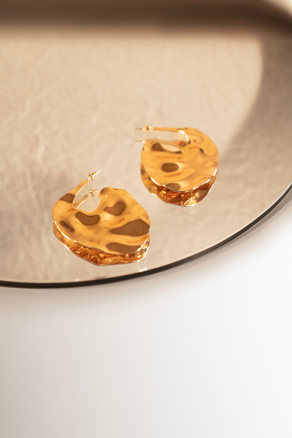 Organic shaped sculptural hoops