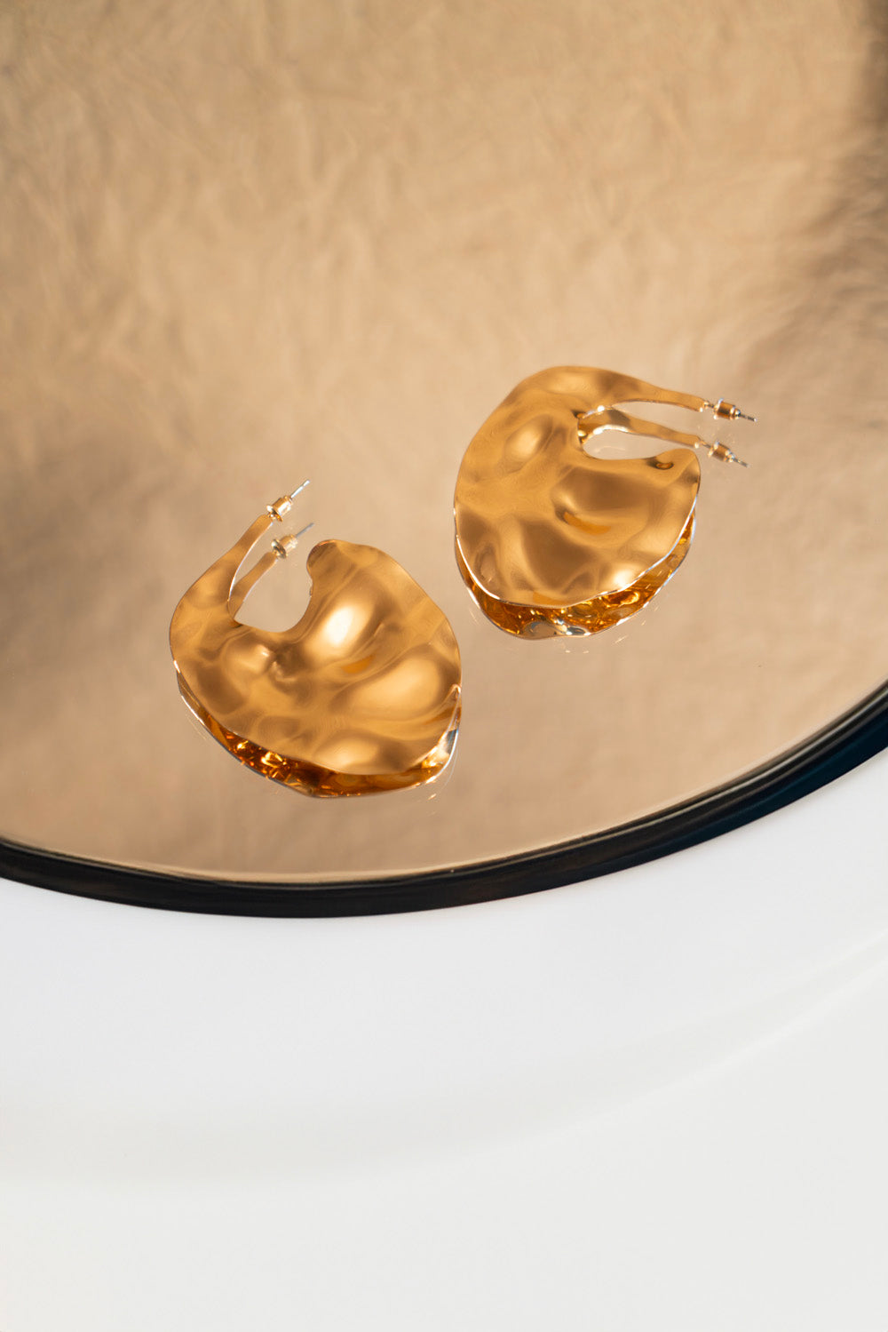 Organic shaped sculptural hoops